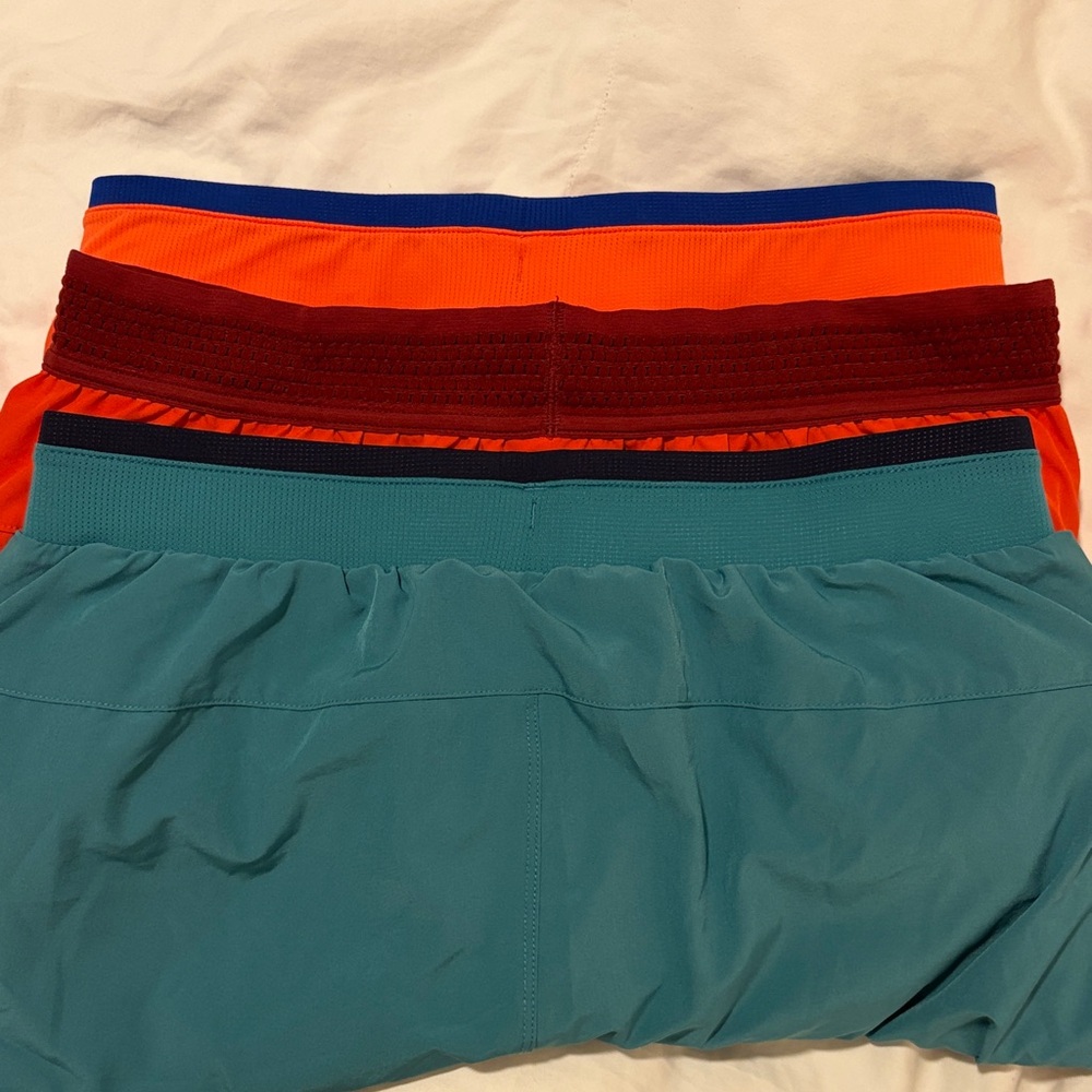Fabletics Men's Athletic Shorts set combo 3 - Orange, Teal, Red - Picture 6 of 12